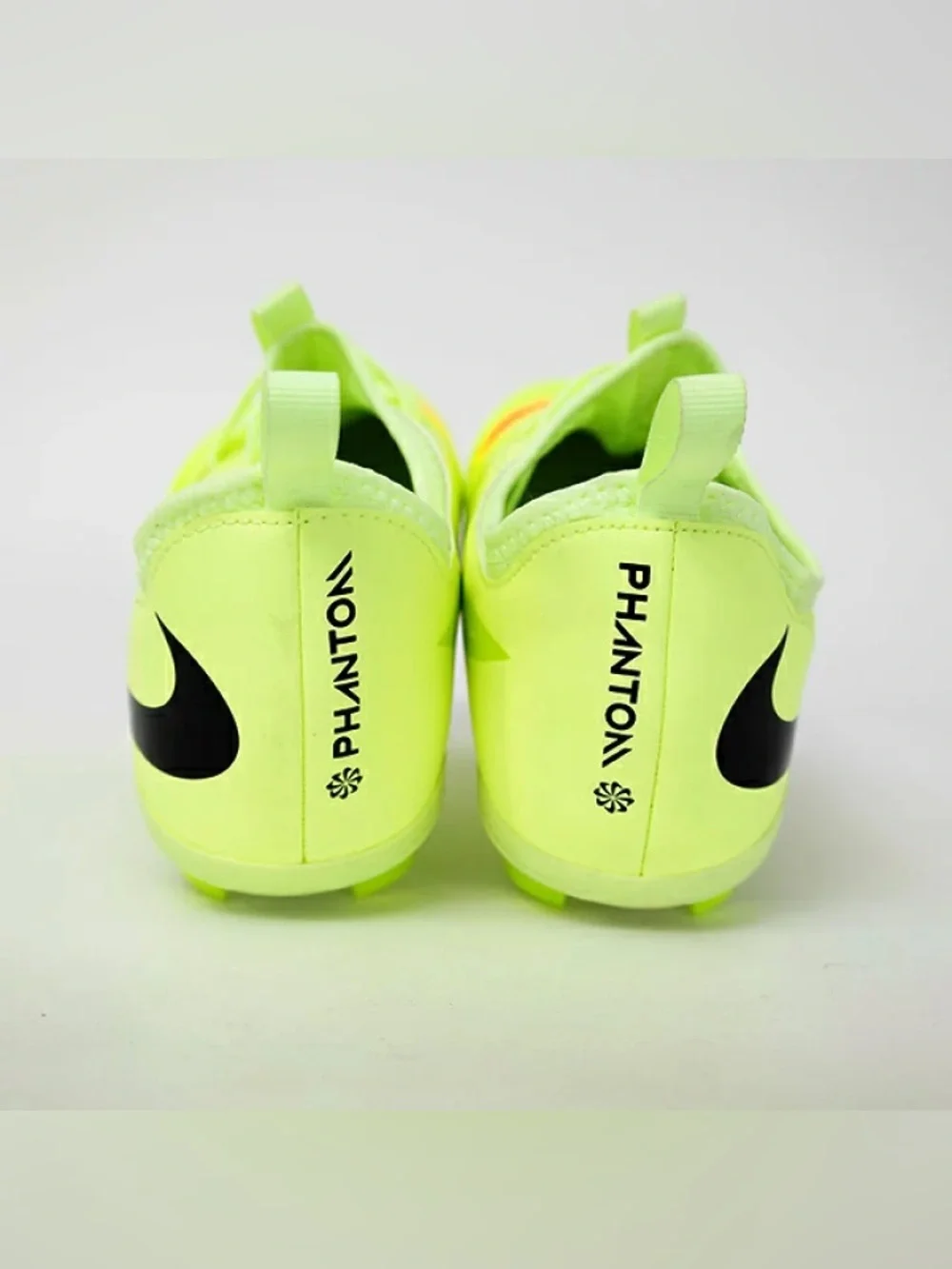 Nike Neon Yellow Soccer Cleats with Orange and Black Accents